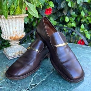 Gucci Cordovan Leather Slip on Loafer with Gold Gucci Bar.